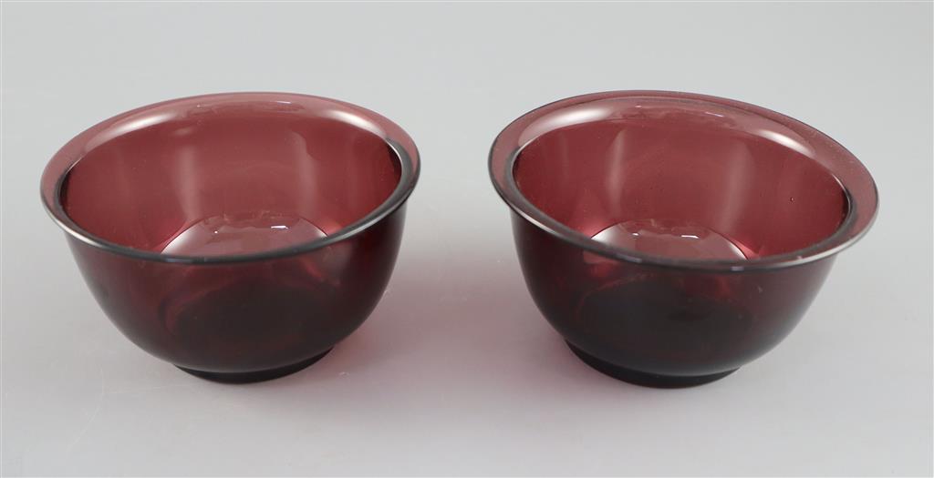 A pair of Chinese Beijing aubergine glass bowls, probably Qing dynasty, 10.5cm diameter